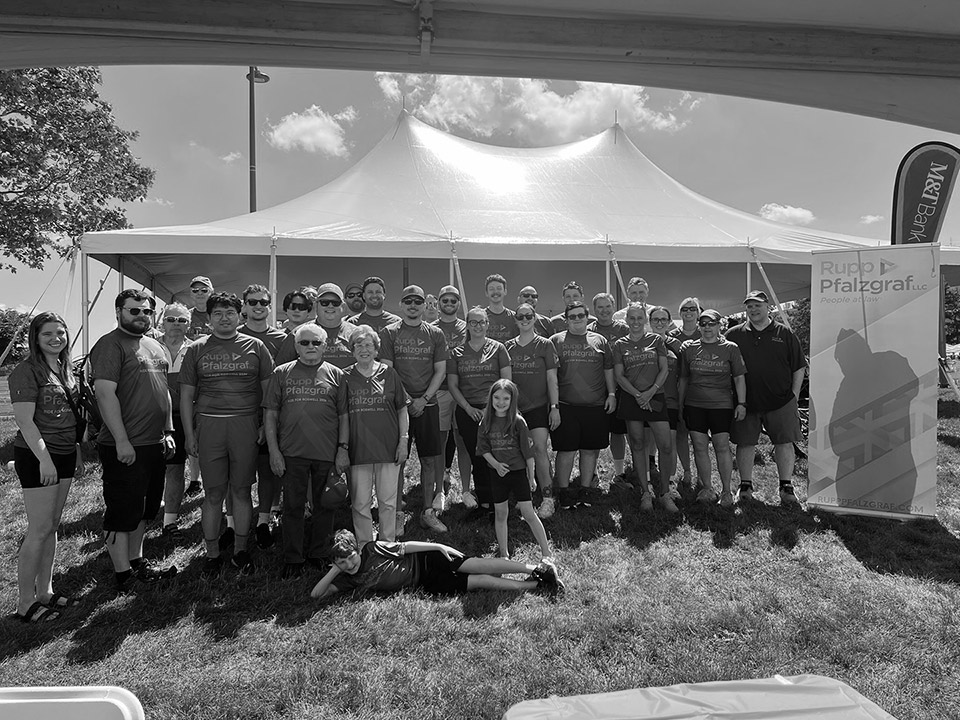 staff gathered for community event